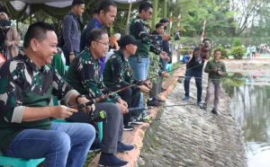 Pj Bupati Muara Enim Buka Lomba Mancing Ikan di Kolam Retensi